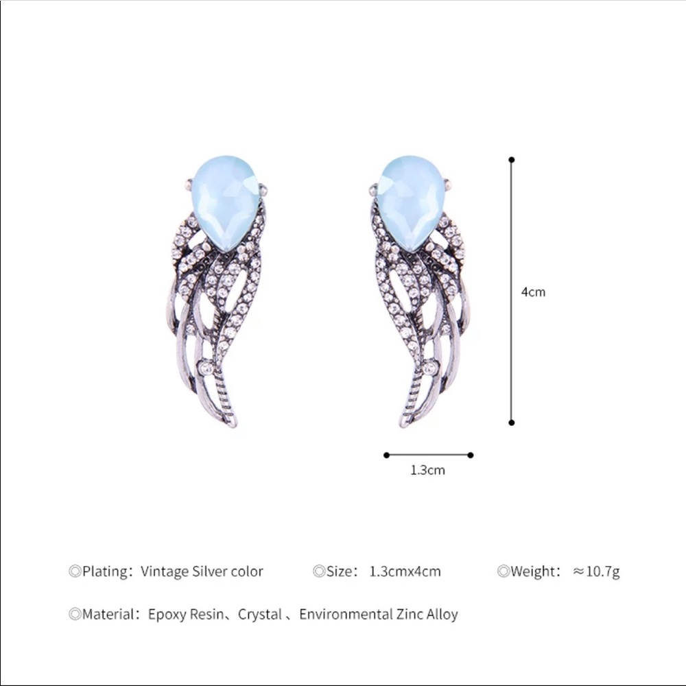 New Hollowed Out Crystal Wing Stud Earrings - Picture 4 of 4